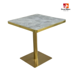 Grey marble dining table with gold base for elegant hospitality dining areas.