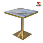 Van Gogh inspired marble dining table with gold base for luxury dining spaces.