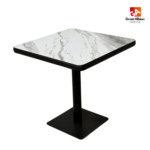 White and grey marble dining table with black base for modern café interiors.