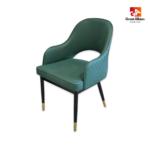 Modern café chair featuring armrests, leather finish, and black legs with gold tips for luxury interiors.