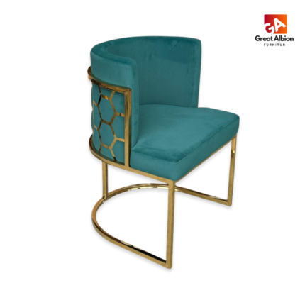 Gold honeycomb metal frame tub chair with upholstered seat for luxury dining and lounge interiors.