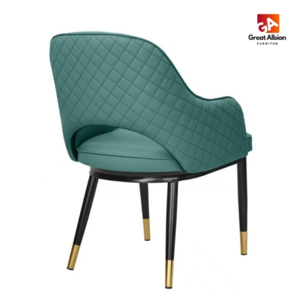 Contemporary velvet restaurant chair featuring quilted back detailing and comfortable wraparound armrest seating.