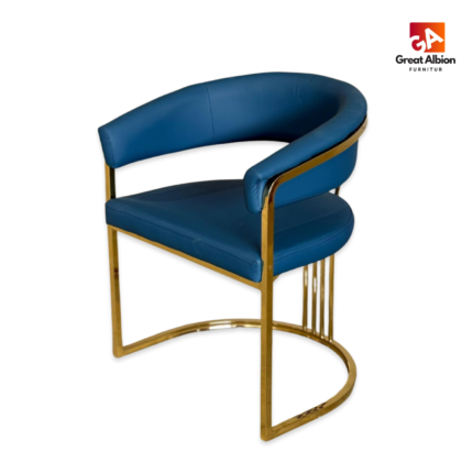 Elegant velvet gold tub chair with curved back design, polished stainless steel frame, and luxurious cushioned seating comfort.