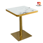 White patterned marble dining table with gold base for restaurants and cafés.