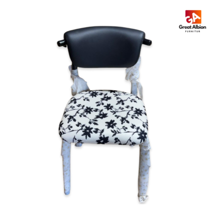 Upholstered restaurant dining chair featuring decorative patterned seat, supportive curved backrest, and durable commercial-grade frame.