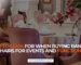 Rows of stacked banquet chairs set up for a formal UK event function in a hotel venue