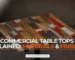 Selection of commercial table tops in wood, laminate and stone finishes for restaurant and café use